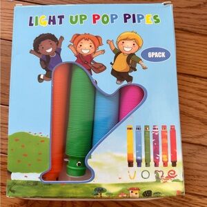 NWT Light up pop pipes